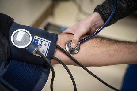 Nurse taking blood pressure